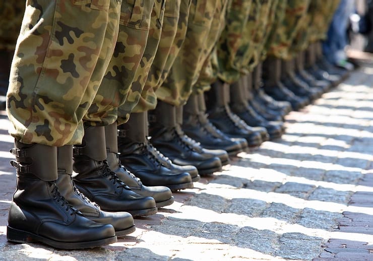 Military personnel lined up_